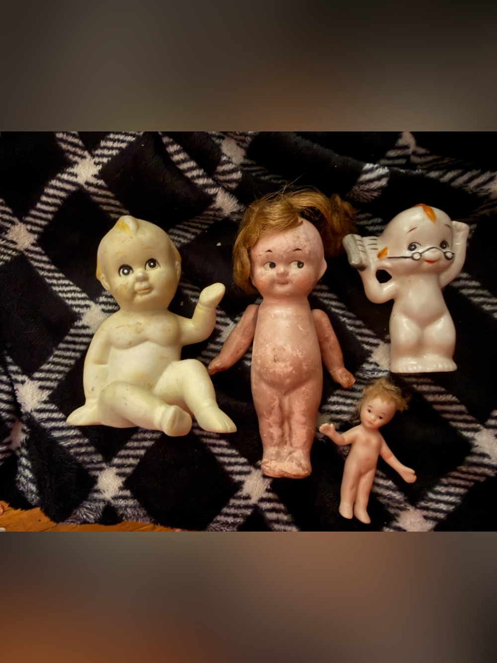 Kewpie style baby doll figurines